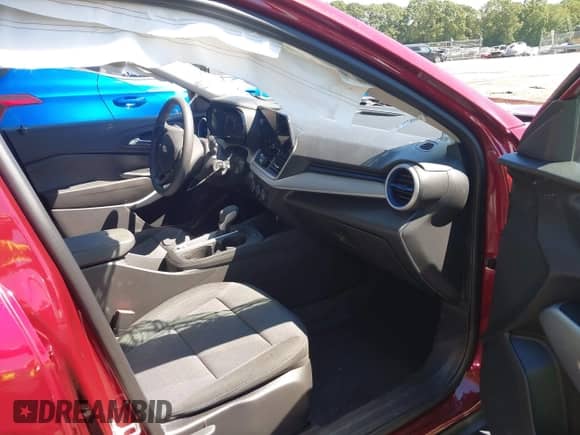 2025 Chevrolet Trax LS with VIN KL77LFEP3SC173444, listed as a IAAI auction lot 43259373 with 18,865 mi miles and . Bid and sale history available at DreamBid. Image 5.