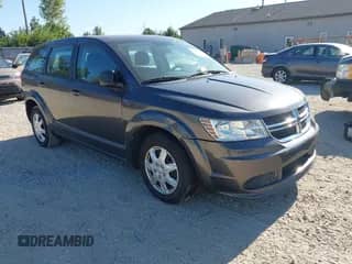 2015 Dodge Journey American Value with VIN 3C4PDCAB2FT692469, listed as a IAAI auction lot 43076925 with 100,000 mi miles and . Bid and sale history available at DreamBid. Image 1.