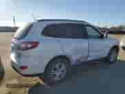 2012 Hyundai Santa Fe GLS с VIN 5XYZGDAG7CG156198, выставлен на аукционе Copart как лот 89409405 с пробегом 122 609 миль миль и Списание • Salvage title. История ставок и продаж доступна на DreamBid. Изображение 3.