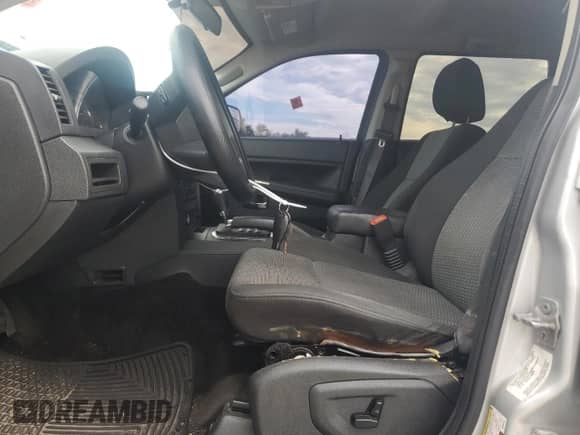 2009 Jeep Grand Cherokee Laredo with VIN 1J8GS48K39C552165, listed as a Copart auction lot 71912915 with 214,755 mi miles and Salvage title. Bid and sale history available at DreamBid. Image 7.