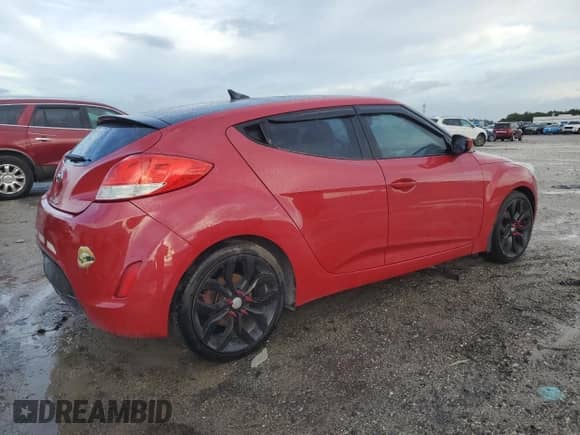 2013 Hyundai Veloster w/Gray Int z VIN KMHTC6AD9DU138767, wystawiony jako Copart lot #85260395 z przebiegiem 176 745 mil mil oraz Szkoda całkowita • Salvage title. Historia ofert i sprzedaży dostępna na DreamBid. Obrazek 3.