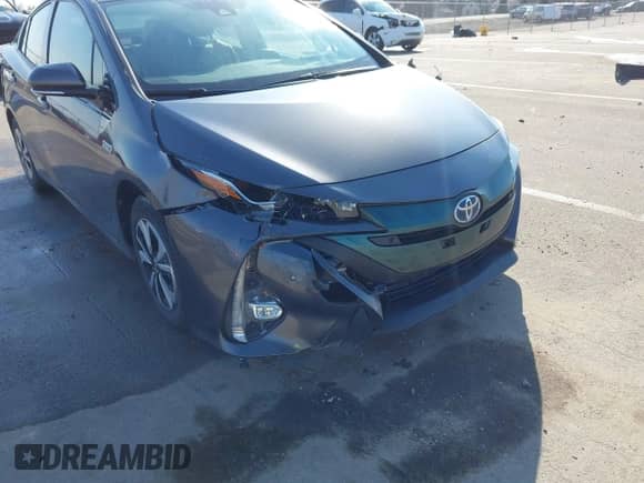 2018 Toyota Prius Plus z VIN JTDKARFP9J3072801, wystawiony jako IAAI lot #41741739 z przebiegiem 80 953 mil mil oraz . Historia ofert i sprzedaży dostępna na DreamBid. Obrazek 6.