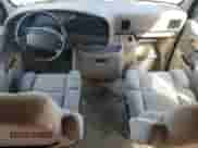 1995 Ford Econoline Cargo with VIN 1FDEE14N4SHA83113, listed as a Copart auction lot 85128635 with Not provided miles and Salvage title. Bid and sale history available at DreamBid. Image 8.