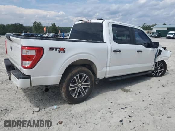 2023 Ford F-150 XL z VIN 1FTEW1EPXPKD18285, wystawiony jako Copart lot #70083095 z przebiegiem 64 678 mil mil oraz Szkoda całkowita • Salvage title. Historia ofert i sprzedaży dostępna na DreamBid. Obrazek 3.