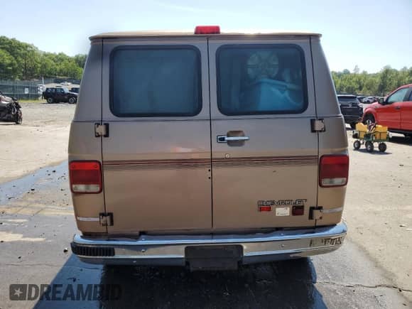 1995 Chevrolet Chevy Van с VIN 1GBEG25Z4SF163727, выставлен на аукционе Copart как лот 68193485 с пробегом 165 321 миль миль и Списание • Salvage title. История ставок и продаж доступна на DreamBid. Изображение 6.