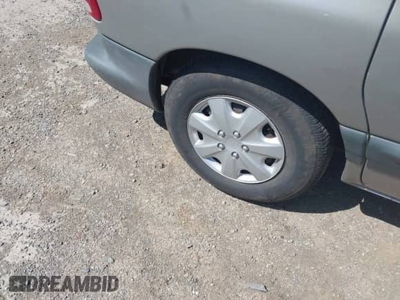 1996 Dodge Caravan SE with VIN 2B4GP4532TR594635, listed as a IAAI auction lot 42339395 with 112,337 mi miles and . Bid and sale history available at DreamBid. Image 6.