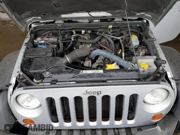 2007 Jeep Wrangler Unlimited Rubicon with VIN 1J4GA69187L127012, listed as a Copart auction lot 48818965 with 61,737 mi miles and Salvage title. Bid and sale history available at DreamBid. Image 12.