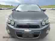 2013 Chevrolet Sonic LTZ с VIN 1G1JE5SH0D4102525, выставлен на аукционе Copart как лот 60976595 с пробегом 138 420 миль миль и Списание • Salvage title. История ставок и продаж доступна на DreamBid. Изображение 5.