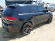 2014 Jeep Grand Cherokee SRT-8 z VIN 1C4RJFDJ7EC527372, wystawiony jako IAAI lot #41889040 z przebiegiem 120 015 mil mil oraz . Historia ofert i sprzedaży dostępna na DreamBid. Obrazek 4.