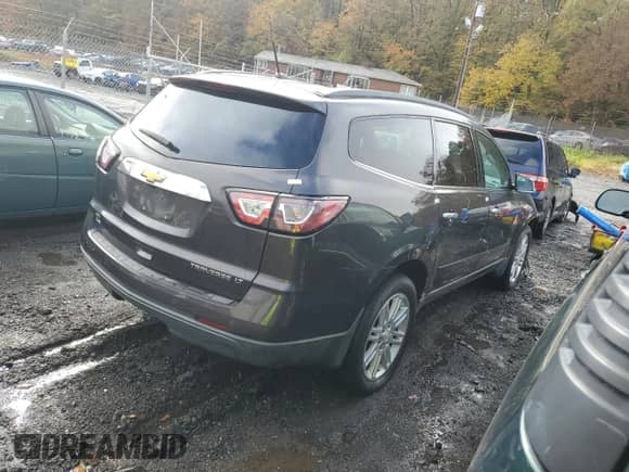 2015 Chevrolet Traverse LT with VIN 1GNKVGKDXFJ210618, listed as a Copart auction lot 90853775 with 111,679 mi miles and Salvage title. Bid and sale history available at DreamBid. Image 3.