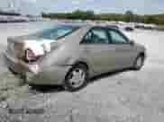 2002 Toyota Camry LE with VIN 4T1BF30K82U510808, listed as a Copart auction lot 82227885 with 160,970 mi miles and Salvage title. Bid and sale history available at DreamBid. Image 3.