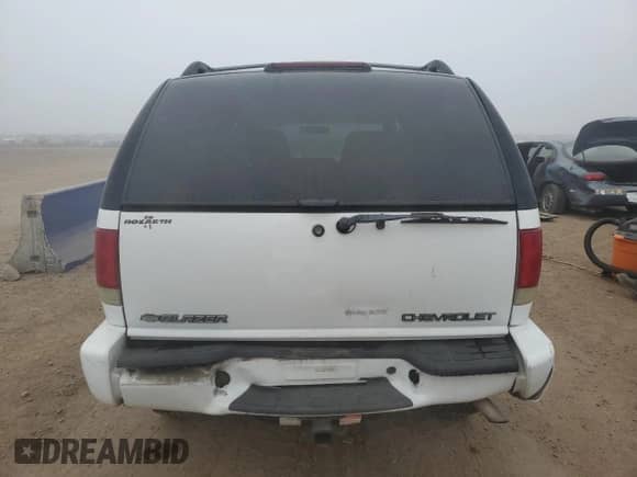 2002 Chevrolet Blazer LS z VIN 1GNDT13W02K156455, wystawiony jako Copart lot #86728515 z przebiegiem 129 995 mil mil oraz Szkoda całkowita • Salvage title. Historia ofert i sprzedaży dostępna na DreamBid. Obrazek 6.