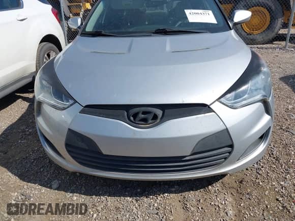 2012 Hyundai Veloster w/Black Int с VIN KMHTC6AD4CU021595, выставлен на аукционе IAAI как лот 42004371 с пробегом 149 637 миль миль и . История ставок и продаж доступна на DreamBid. Изображение 6.