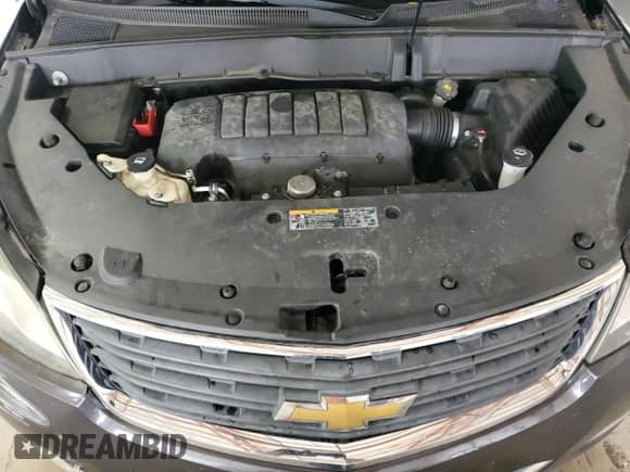 2014 Chevrolet Traverse LS с VIN 1GNKRFKD2EJ210402, выставлен на аукционе Copart как лот 69538565 с пробегом 172 906 миль миль и Списание • Salvage title. История ставок и продаж доступна на DreamBid. Изображение 12.