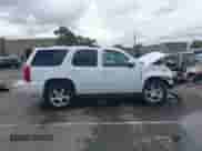 2013 Chevrolet Tahoe LTZ with VIN 1GNSKCE07DR123820, listed as a IAAI auction lot 43353310 with 105,053 mi miles and . Bid and sale history available at DreamBid. Image 14.