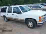 1999 Chevrolet Suburban z VIN 1GNEC16R2XJ362108, wystawiony jako IAAI lot #42973441 z przebiegiem 308 292 mil mil oraz . Historia ofert i sprzedaży dostępna na DreamBid. Obrazek 1.