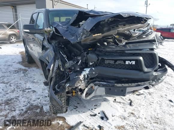 2022 Ram 1500 Rebel z VIN 1C6SRFLT9NN204868, wystawiony jako IAAI lot #41351273 z przebiegiem 67 120 mil mil oraz . Historia ofert i sprzedaży dostępna na DreamBid. Obrazek 6.