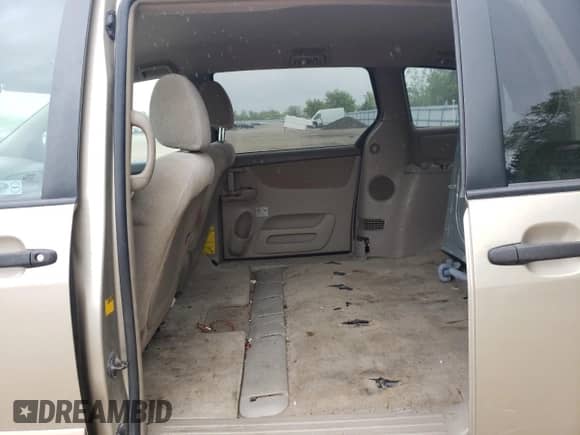 2009 Toyota Sienna CE с VIN 5TDZK29C09S249094, выставлен на аукционе Copart как лот 58906735 с пробегом 293 043 миль миль и Списание • Salvage title. История ставок и продаж доступна на DreamBid. Изображение 11.