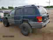 2002 Jeep Grand Cherokee Laredo with VIN 1J8GW48S82C159112, listed as a Copart auction lot 84000665 with 204,396 mi miles and Salvage title. Bid and sale history available at DreamBid. Image 2.