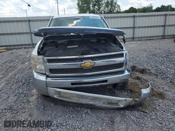 2012 Chevrolet Silverado 1500 LT с VIN 3GCPCSEA1CG105584, выставлен на аукционе Copart как лот 68685845 с пробегом 247 987 миль миль и Списание • Salvage title. История ставок и продаж доступна на DreamBid. Изображение 5.
