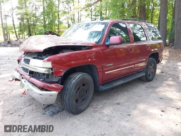 2003 Chevrolet Tahoe LT with VIN 1GNEK13Z73J229314, listed as a IAAI auction lot 42414503 with 256,182 mi miles and . Bid and sale history available at DreamBid. Image 2.