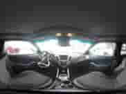 2015 Hyundai Veloster z VIN KMHTC6AD0FU243328, wystawiony jako IAAI lot #42439313 z przebiegiem 96 997 mil mil oraz . Historia ofert i sprzedaży dostępna na DreamBid. Obrazek 19.