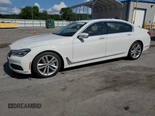 2016 BMW 7 Series 750i with VIN WBA7F0C57GGL99914, listed as a Copart auction lot 60837285 with 102,358 mi miles and Salvage title. Bid and sale history available at DreamBid. Image 1.