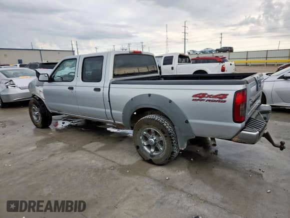 2003 Nissan Frontier XE with VIN 1N6ED29Y73C456401, listed as a Copart auction lot 69845955 with Not provided miles and Salvage title. Bid and sale history available at DreamBid. Image 2.
