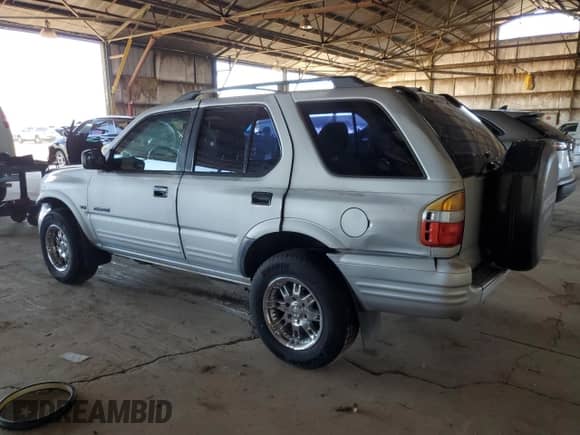 2000 Honda Passport LX with VIN 4S6CK58W6Y4409186, listed as a Copart auction lot 82193655 with 151,884 mi miles and Salvage title. Bid and sale history available at DreamBid. Image 2.