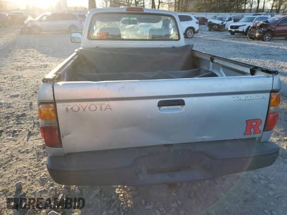 2003 Toyota Tacoma with VIN 5TENL42NX3Z150327, listed as a Copart auction lot 41579785 with 187,714 mi miles and Salvage title. Bid and sale history available at DreamBid. Image 6.