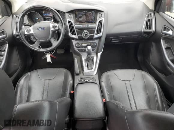 2014 Ford Focus Titanium with VIN 1FADP3J26EL227901, listed as a Copart auction lot 70023645 with 68,796 mi miles and Salvage title. Bid and sale history available at DreamBid. Image 8.