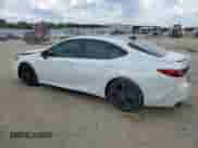 2025 Toyota Camry LE with VIN 4T1DAACK2SU094469, listed as a Copart auction lot 70592455 with 13,577 mi miles and Salvage title. Bid and sale history available at DreamBid. Image 2.