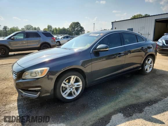 2015 Volvo S60 T5 Drive-E Premier with VIN YV140MFK7F1346612, listed as a Copart auction lot 80946095 with 130,344 mi miles and Salvage title. Bid and sale history available at DreamBid. Image 1.