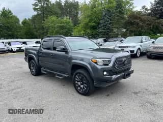 2022 Toyota Tacoma Limited с VIN 3TMGZ5AN7NM458988, выставлен на аукционе Copart как лот 65398105 с пробегом 32 115 миль миль и Списание • Salvage title. История ставок и продаж доступна на DreamBid. Изображение 1.