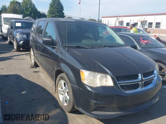 2013 Dodge Grand Caravan American Value with VIN 2C4RDGBG1DR601010, listed as a IAAI auction lot 43293889 with 156,529 mi miles and . Bid and sale history available at DreamBid. Image 1.