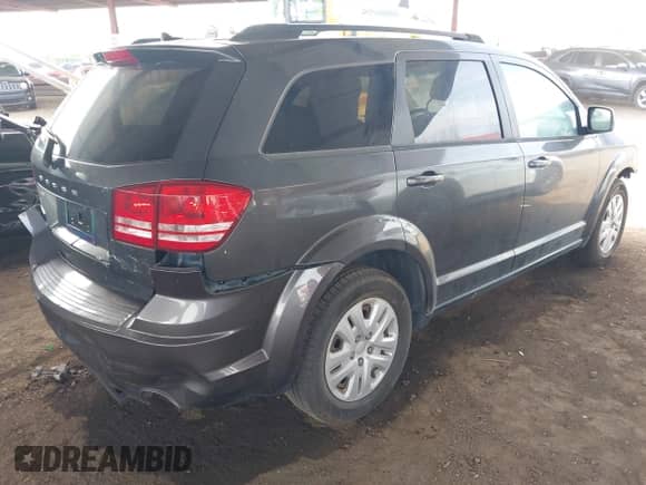 2016 Dodge Journey SE with VIN 3C4PDCAB3GT119372, listed as a IAAI auction lot 43062798 with 162,140 mi miles and . Bid and sale history available at DreamBid. Image 4.