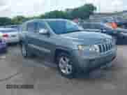 2012 Jeep Grand Cherokee Limited z VIN 1C4RJEBGXCC290696, wystawiony jako IAAI lot #42753634 z przebiegiem 205 808 mil mil oraz . Historia ofert i sprzedaży dostępna na DreamBid. Obrazek 1.