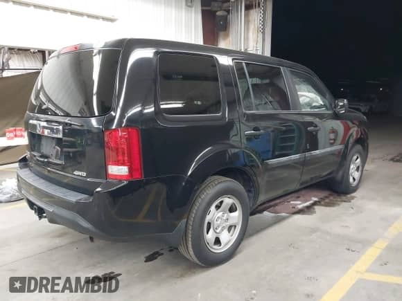 2015 Honda Pilot LX with VIN 5FNYF4H2XFB019714, listed as a IAAI auction lot 43243273 with 124,959 mi miles and . Bid and sale history available at DreamBid. Image 4.