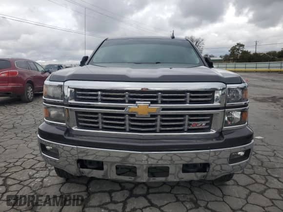 2015 Chevrolet Silverado 1500 LT с VIN 3GCUKREH3FG375593, выставлен на аукционе Copart как лот 90621815 с пробегом 128 700 миль миль и Списание • Salvage title. История ставок и продаж доступна на DreamBid. Изображение 5.