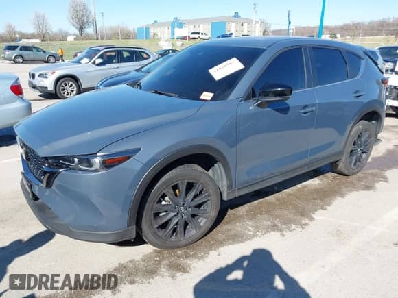 2022 Mazda CX-5 S Carbon Edition z VIN JM3KFBCMXN1619568, wystawiony jako IAAI lot #41828567 z przebiegiem 41 475 mil mil oraz . Historia ofert i sprzedaży dostępna na DreamBid. Obrazek 17.