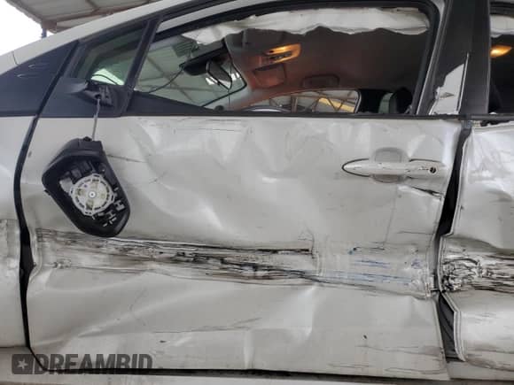 2021 Toyota Prius LE with VIN JTDL9MFU6M3030578, listed as a Copart auction lot 51112005 with 91,141 mi miles and Non repairable. Bid and sale history available at DreamBid. Image 7.