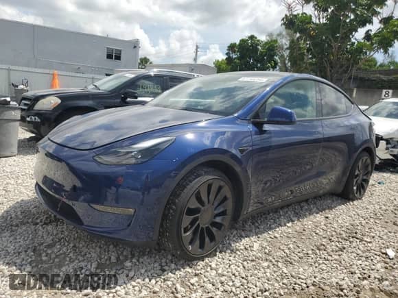 2022 Tesla Model Y Performance with VIN 7SAYGDEF6NF455028, listed as a Copart auction lot 61740254 with 26,869 mi miles and Salvage title. Bid and sale history available at DreamBid. Image 1.