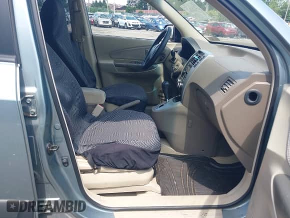 2007 Hyundai Tucson SE z VIN KM8JN72D97U492895, wystawiony jako IAAI lot #42556997 z przebiegiem 100 254 mil mil oraz . Historia ofert i sprzedaży dostępna na DreamBid. Obrazek 5.