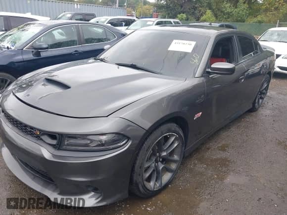 2021 Dodge Charger Scat Pack Widebody with VIN 2C3CDXGJ2MH648700, listed as a IAAI auction lot 43170230 with 44,217 mi miles and . Bid and sale history available at DreamBid. Image 18.