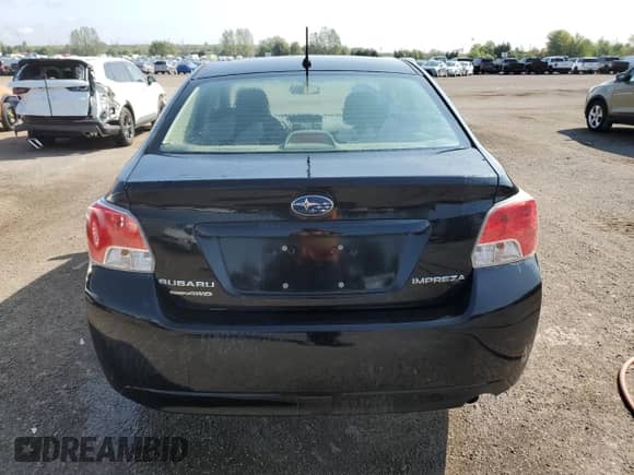 2012 Subaru Impreza 2.0i z VIN JF1GJAA63CH011154, wystawiony jako Copart lot #71118165 z przebiegiem 148 289 mil mil oraz Czysty tytuł • Clean title. Historia ofert i sprzedaży dostępna na DreamBid. Obrazek 6.