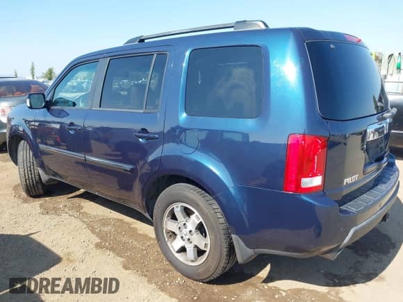 2009 Honda Pilot Touring with VIN 5FNYF38839B003759, listed as a IAAI auction lot 42594357 with 208,297 mi miles and . Bid and sale history available at DreamBid. Image 3.