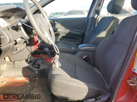 2005 Dodge Neon SXT z VIN 1B3ES56C85D201998, wystawiony jako Copart lot #44602775 z przebiegiem 117 651 mil mil oraz Szkoda całkowita • Salvage title. Historia ofert i sprzedaży dostępna na DreamBid. Obrazek 7.