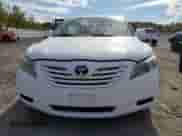 2009 Toyota Camry LE z VIN 4T1BE46KX9U806116, wystawiony jako Copart lot #85261255 z przebiegiem 196 982 mil mil oraz Czysty tytuł • Clean title. Historia ofert i sprzedaży dostępna na DreamBid. Obrazek 5.