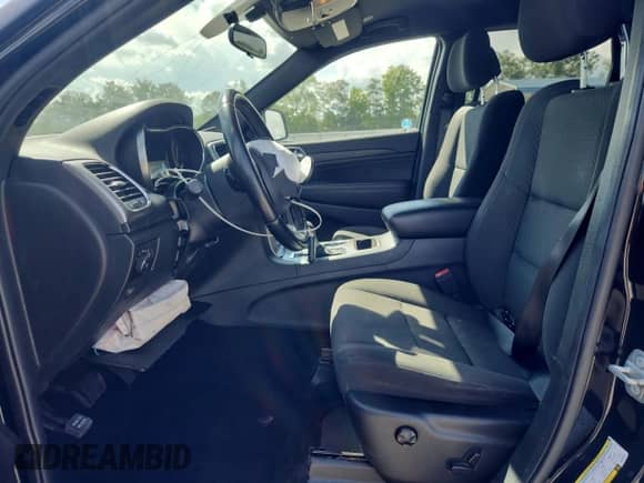 2020 Jeep Grand Cherokee Laredo E with VIN 1C4RJEAG5LC282734, listed as a Copart auction lot 65259675 with 109,022 mi miles and Salvage title. Bid and sale history available at DreamBid. Image 7.