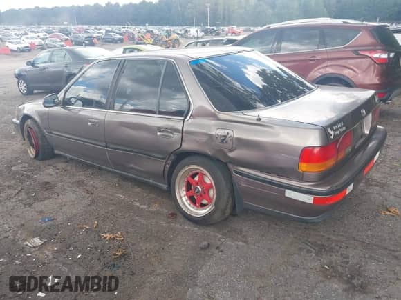 1993 Honda Accord z VIN 1HGCB7651PA045327, wystawiony jako IAAI lot #42841333 z przebiegiem 127 703 mil mil oraz . Historia ofert i sprzedaży dostępna na DreamBid. Obrazek 3.